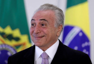 Brazil's President Michel Temer smiles during a signing ceremony of the New Decree of Port Regularization, at the Planalto Palace in Brasilia, Brazil May 10, 2017. REUTERS/Ueslei Marcelino