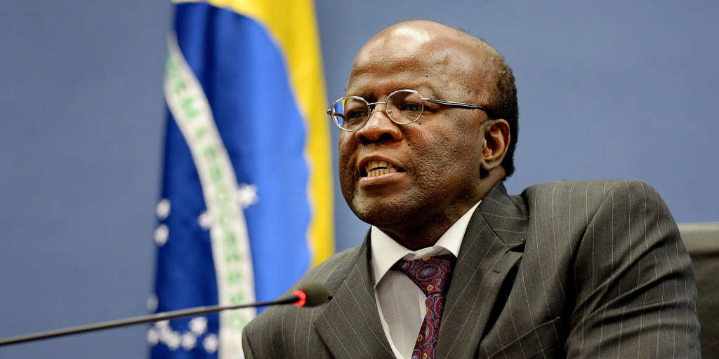 Brazilian Supreme Court President Joaquim Barbosa speaks during a press conference at the National Justice Council after a meeting with Brazilian President Dilma Rousseff in Brasilia in June 25, 2013. Rousseff met with leaders from several sectors of society to discuss proposals submitted yesterday to governors. AFP PHOTO/Evaristo Sa        (Photo credit should read EVARISTO SA/AFP/Getty Images)