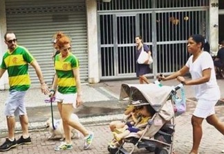 Babá de foto polêmica em manifestação contra Dilma defende uso de uniforme