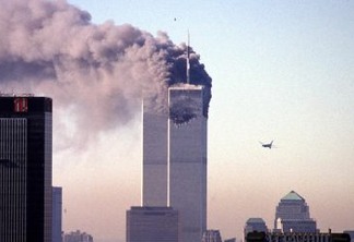 A hijacked commercial plane approaches the World Trade Center shortly before crashing into the landmark skyscraper 11 September 2001 in New York.   AFP PHOTO/Seth McCallister