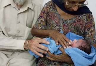 In this undated handout photograph released by The National Fertility Centre on May 10, 2016, Indian couple Mohinder Singh Gill(L)poses with his wife Daljinder Kaur and their newly born baby at The National Fertility Centre in Hisar. 
An Indian woman who gave birth at the age of 70 said May 10, 2016, that she was not too old to become a first-time mother, adding that her life was now complete. Daljinder Kaur gave birth last month to a boy following two years of IVF treatment at a fertility clinic in the northern state of Haryana with her 79-year-old husband.

RESTRICTED TO EDITORIAL USE - MANDATORY CREDIT "AFP PHOTO / NATIONAL FERTILITY CENTRE" - NO MARKETING NO ADVERTISING CAMPAIGNS - DISTRIBUTED AS A SERVICE TO CLIENTS / AFP PHOTO / NATIONAL FERTILITY CENTRE / HO / RESTRICTED TO EDITORIAL USE - MANDATORY CREDIT "AFP PHOTO / NATIONAL FERTILITY CENTRE" - NO MARKETING NO ADVERTISING CAMPAIGNS - DISTRIBUTED AS A SERVICE TO CLIENTS