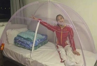 Preocupadas com o vírus da zika, ginastas chinesas dormem em camas cobertas com telas