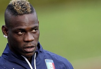 Italian national soccer team's Mario Balotelli attends a training session with the team at the Coverciano Training Center, near Florence, central Italy, Monday, Nov.10, 2014. Italy will play Croatia in Milan on Sunday in a Euro2016, Group H, qualifying round soccer match. (AP Photo/Fabrizio Giovannozzi)