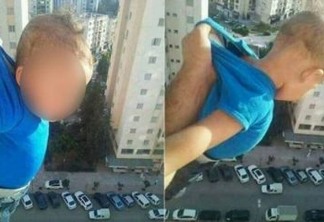 Homem é preso após postar foto balançando bebê em janela de prédio