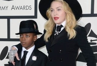 LOS ANGELES, CA - JANUARY 26:  Singer Madonna and son David Banda Mwale Ciccone Ritchie attend the 56th GRAMMY Awards at Staples Center on January 26, 2014 in Los Angeles, California.  (Photo by Jason Merritt/Getty Images)