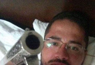 Padre causa polêmica após postar foto com arma em rede social