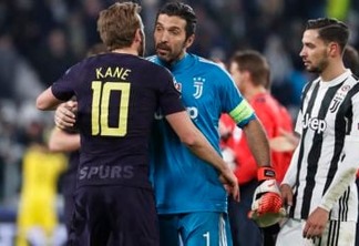 Juventus goalkeeper Gianluigi Buffon greets Tottenham's Harry Kane (left), as Juventus' Mattia de Sciglio looks at them, at the end of the Champions League, round of 16, first-leg soccer match between Juventus and Tottenham Hotspurs, at the Allianz Stadium in Turin, Italy, on Tuesday, February 13, 2018. Photo: AP