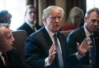 US President Donald Trump speaks during a cabinet meeting at the White House in Washington, DC, on April 9, 2018.
President Donald Trump said Monday that "major decisions" would be made on a Syria response in the next day or two, after warning that Damascus would have a "big price to pay" over an alleged chemical attack on a rebel-held town.Trump condemned what he called a "heinous attack on innocent" Syrians in Douma, as he opened a cabinet meeting at the White House. 
 / AFP PHOTO / NICHOLAS KAMM
