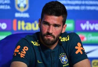 Brazil's goalkeeper Alisson attends a press conference at Yug Sport Stadium in Sochi on June 12, 2018, ahead of the Russia 2018 World Cup football tournament. / AFP PHOTO / NELSON ALMEIDA