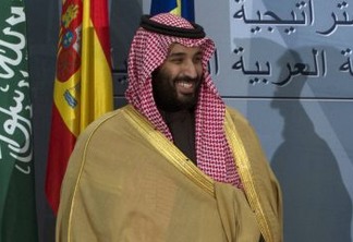 FILE - In this April 12, 2018, file photo, Saudi Crown Prince Mohammed bin Salman prepares to leave after a signing ceremony with Spain's Prime Minister Mariano Rajoy in Madrid, Spain. The killing of Saudi journalist Jamal Khashoggi at the kingdom’s consulate in Istanbul on Oct. 2, 2018, is unlikely to halt Salman’s rise to power, but could cause irreparable harm to relations with Western governments and businesses, potentially endangering his ambitious reform plans. (AP Photo/Paul White, File)