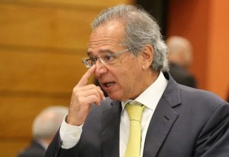 FILE PHOTO: Economist Paulo Guedes is seen before a lunch between businessmen and Federal deputy Bolsonaro a candidate for the Presidency of the Republic for the PSL at the Federation of Industries of Rio de Janeiro (FIRJAN) headquarters in Rio de Janeiro, Brazil August 6, 2018. REUTERS/Sergio Moraes/File Photo