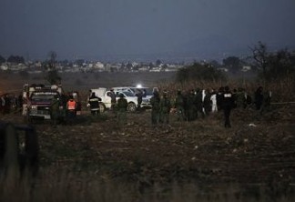 CORRECTS THE LOCATION TO NEAR PUEBLA CITY, NOT MEXICO CITY - Emergency rescue personnel, the army and the police arrive to the scene of a helicopter crash where Puebla Gov. Martha Erika Alonso and her husband Rafael Moreno Valle, a former Puebla governor, died near Puebla City, southeast of Mexico City on Monday, Dec. 24, 2018. The husband-and-wife political power couple died Christmas Eve in the crash, Mexican officials reported. (AP Photo/Pablo Spencer)