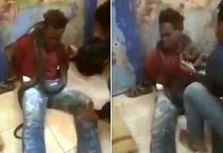 TORTURA: policial põe cobra em volta do pescoço de suspeito de furto para fazê-lo confessar - VEJA VÍDEO