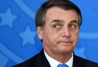 Brazilian President Jair Bolsonaro is pictured during the commemoration ceremony of the National Volunteer Day, at Planalto Palace in Brasilia, on August 28, 2019. - Bolsonaro on Wednesday repeated a demand for French leader Emmanuel Macron to withdraw recent remarks, as he accused France and Germany of "buying" the Latin American country's sovereignty with Amazon fire aid. Bolsonaro's comments come a day after he said he was open to discussing the G7's offer of $20 million to help combat fires raging in the world's largest rainforest, but only if the French leader retracted his "insults" against him. (Photo by EVARISTO SA / AFP)