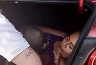 Mulher se esconde com o filho em mala de carro para vigiar o marido, motorista de aplicativo