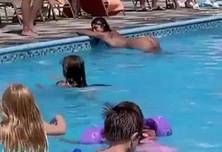 Banhista provoca debate ao posar para foto sexy diante de crianças em piscina - VEJA VÍDEO