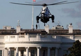 WASHINGTON, DC - OCTOBER 02: Marine One, the presidential helicopter, arrives at the White House to carry U.S. President Donald Trump to Walter Reed National Military Medical Center October 2, 2020 in Washington, DC. Trump announced earlier today via Twitter that he and U.S. first lady Melania Trump have tested positive for coronavirus.   Win McNamee/Getty Images/AFP