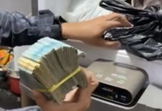 DINDIM DE DINHEIRO: polícia encontra R$ 29.000 em congelador durante operação contra suspeito de crimes em Cabedelo - VEJA VÍDEO