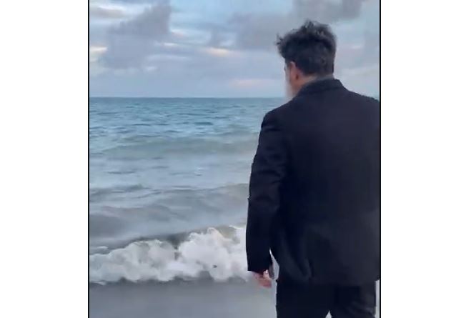 Capturar.JPGu  - 'Mais tempo com a família': Juiz paraibano comemora aposentadoria pulando no mar de paletó - VEJA VÍDEO