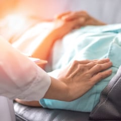 Caregiver, carer hand holding elder hand woman in hospice care. Philanthropy kindness to disabled concept.Public Service Recognition Week (Caregiver, carer hand holding elder hand woman in hospice care. Philanthropy kindness to disabled concept.Public