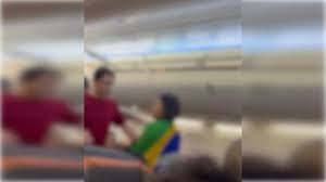 INUSITADO: Mulher com bandeira do Brasil diz que não viaja com petistas e é expulsa de avião - VEJA O VÍDEO
